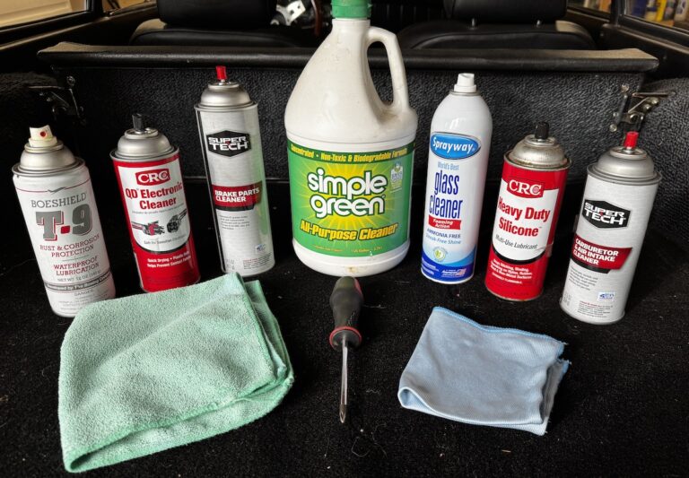 A selection of autmotive supplies for cleaning and lubricating parts.
